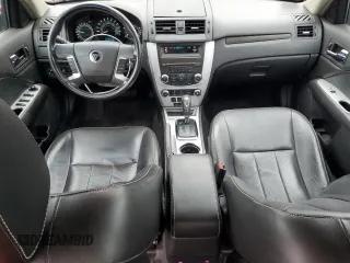 2010 Mercury Milan Premier z VIN 3MEHM0JA5AR601564, wystawiony jako Copart lot #51791795 z przebiegiem 123 290 mil mil oraz Szkoda całkowita • Salvage title. Historia ofert i sprzedaży dostępna na DreamBid. Obrazek 8.