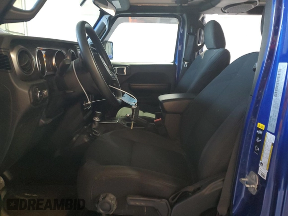 2020 Jeep Wrangler Unlimited Black and Tan with VIN 1C4HJXDG1LW267312, listed as a Copart auction lot 49658135 with 66,624 mi miles and Salvage title. Bid and sale history available at DreamBid. Image 7.