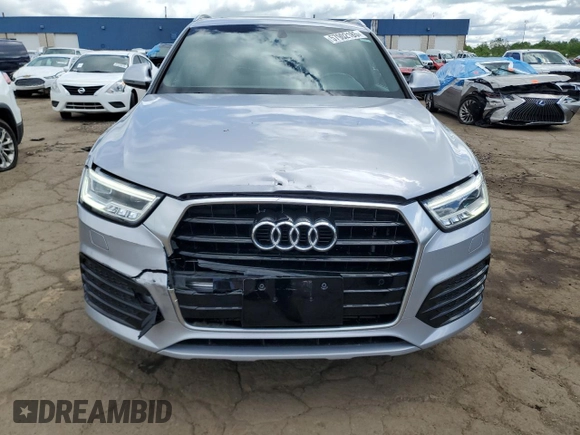2017 Audi Q3 Prestige with VIN WA1GCCFS0HR005569, listed as a Copart auction lot 57902185 with 89,900 mi miles and Salvage title. Bid and sale history available at DreamBid. Image 5.