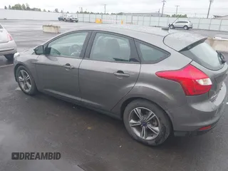 2014 Ford Focus SE with VIN 1FADP3K21EL462169, listed as a IAAI auction lot 42145524 with 100,156 mi miles. Bid and sale history available at carsss.com. Image 3.