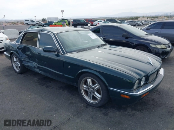 2003 Jaguar XJ with VIN SAJDA15B73MF53499, listed as a IAAI auction lot 41896445 with 95,055 mi miles and . Bid and sale history available at DreamBid. Image 1.