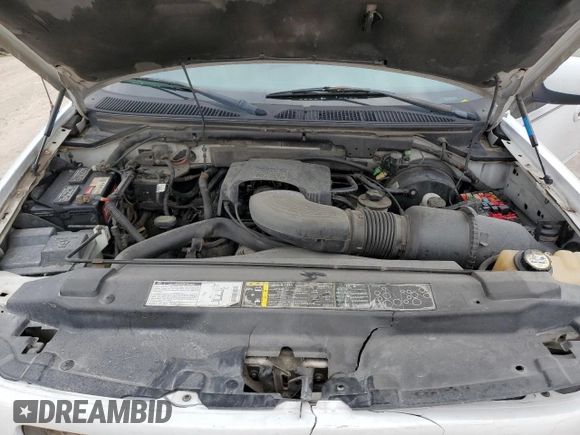2001 Ford F-150 XLT with VIN 1FTRW07L01KC60815, listed as a Copart auction lot 87022424 with 205,304 mi miles and Salvage title. Bid and sale history available at DreamBid. Image 12.