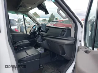 2022 Ford Transit Cargo with VIN 1FTBR1C83NKA78404, listed as a IAAI auction lot 40335158 with 31,273 mi miles and . Bid and sale history available at DreamBid. Image 5.