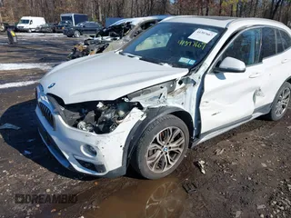 2017 BMW X1 xDrive28i with VIN WBXHT3Z36H4A52364, listed as a IAAI auction lot 41397667 with 61,960 mi miles. Bid and sale history available at carsss.com. Image 6.