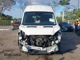 2021 Ford Transit Cargo with VIN 1FTBR1X87MKA50288, listed as a IAAI auction lot 41432535 with 96,934 mi miles and . Bid and sale history available at DreamBid. Image 12.