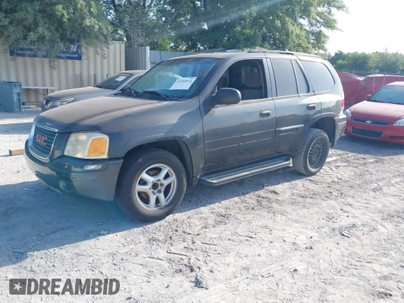 2004 GMC Envoy SLE with VIN 1GKDS13S342117178, listed as a IAAI auction lot 42164611 with 181,287 mi miles and . Bid and sale history available at DreamBid. Image 2.