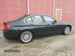 2012 BMW 3 Series 328i with VIN WBA3A5C57CF345040, listed as a Copart auction lot 63761735 with 106,665 mi miles and Clean title. Bid and sale history available at DreamBid. Image 3.
