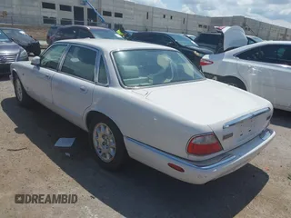 2003 Jaguar XJ 8 with VIN SAJDA14C03LF52338, listed as a IAAI auction lot 42684038 with 142,107 mi miles and . Bid and sale history available at DreamBid. Image 3.
