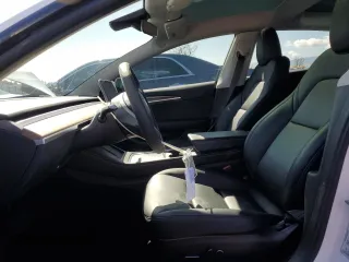 2023 Tesla Model 3 with VIN 5YJ3E1EA9PF558527, listed as a Copart auction lot 48754535 with 21,801 mi miles and Salvage Title. Bid and sale history available at DreamBid. Image 7.