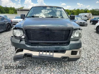 2004 Ford F-150 XL with VIN 1FTPX12564NA87792, listed as a Copart auction lot 60489655 with 396,269 mi miles and Salvage title. Bid and sale history available at DreamBid. Image 5.