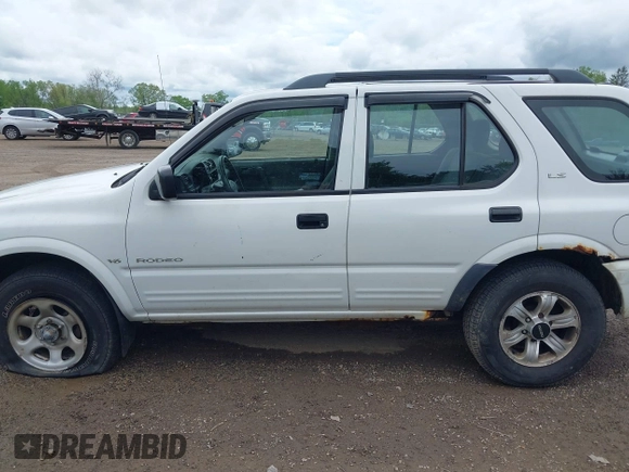 2000 Isuzu Rodeo z VIN 4S2DM58W6Y4312571, wystawiony jako IAAI lot #42253955 z przebiegiem 84 517 mil mil oraz . Historia ofert i sprzedaży dostępna na DreamBid. Obrazek 14.