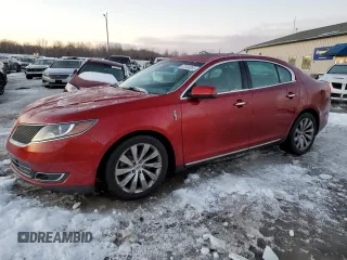 2015 Lincoln MKS with VIN 1LNHL9EK1FG606606, listed as a Copart auction lot 87534065 with 67,394 mi miles and Salvage title. Bid and sale history available at DreamBid. Image 1.
