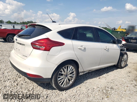2017 Ford Focus Titanium с VIN 1FADP3N2XHL283063, выставлен на аукционе Copart как лот 54584085 с пробегом 80 822 миль миль и Списание • Salvage title. История ставок и продаж доступна на DreamBid. Изображение 3.