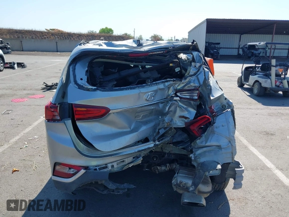 2020 Hyundai Santa Fe SE z VIN 5NMS2CAD1LH221326, wystawiony jako IAAI lot #42442177 z przebiegiem 68 995 mil mil oraz . Historia ofert i sprzedaży dostępna na DreamBid. Obrazek 17.