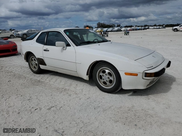 1986 Porsche 944 with VIN WP0AA0948GN453769, listed as a Copart auction lot 76462054 with 264,439 mi miles and Salvage Title. Bid and sale history available at carsss.com. Image 4.