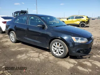 2012 Volkswagen Jetta SE with VIN 3VWDP7AJ4CM346564, listed as a Copart auction lot 52766775 with 157,384 mi miles and Salvage title. Bid and sale history available at DreamBid. Image 4.