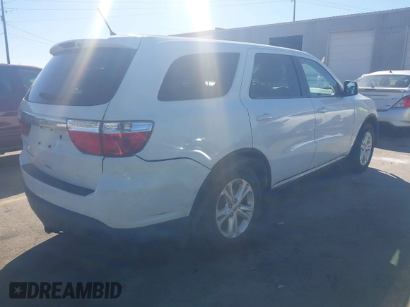 2013 Dodge Durango Special Service with VIN 1C4SDJFT8DC658044, listed as a IAAI auction lot 41871863 with 214,545 mi miles and . Bid and sale history available at carsss.com. Image 4.