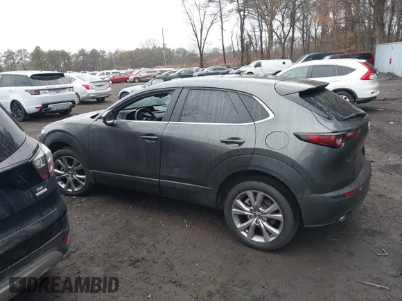 2021 Mazda CX-30 Select with VIN 3MVDMBBL2MM312752, listed as a IAAI auction lot 41933342 with 52,213 mi miles and . Bid and sale history available at DreamBid. Image 14.