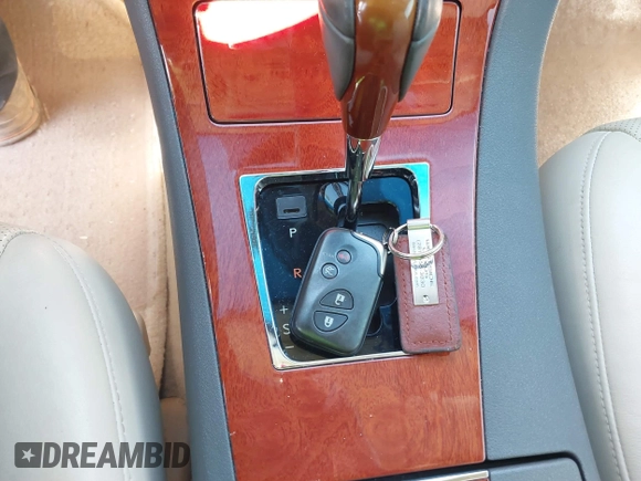 2012 Lexus ES 330 z VIN JTHBK1EG9C2484918, wystawiony jako IAAI lot #41600345 z przebiegiem 173 454 mil mil oraz . Historia ofert i sprzedaży dostępna na DreamBid. Obrazek 11.