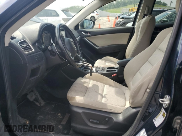 2016 Mazda CX-5 Touring с VIN JM3KE4CY8G0686101, выставлен на аукционе Copart как лот 60361215 с пробегом 126 804 миль миль и На запчасти • Non repairable. История ставок и продаж доступна на DreamBid. Изображение 7.