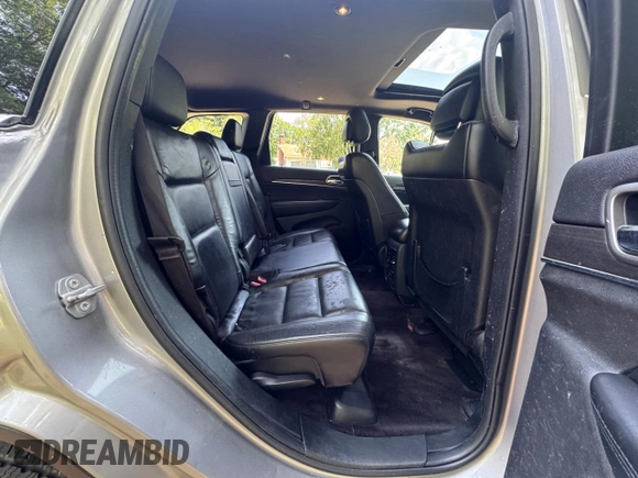 2018 Jeep Grand Cherokee Limited z VIN 1C4RJFBG1JC171096, wystawiony jako Copart lot #62341065 z przebiegiem 149 693 mil mil oraz Czysty tytuł • Clean title. Historia ofert i sprzedaży dostępna na DreamBid. Obrazek 6.