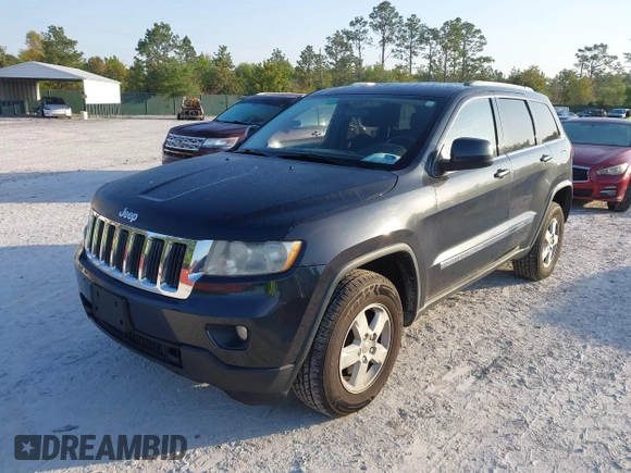 2012 Jeep Grand Cherokee Laredo with VIN 1C4RJFAG5CC234382, listed as a IAAI auction lot 42010153 with 185,078 mi miles. Bid and sale history available at carsss.com. Image 17.