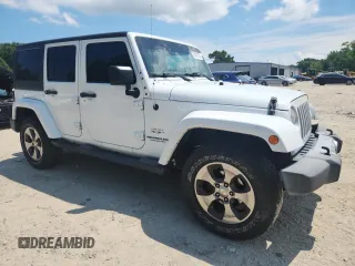 2016 Jeep Wrangler Unlimited Sahara с VIN 1C4HJWEG3GL346528, выставлен на аукционе Copart как лот 65092755 с пробегом 127 393 миль миль и Списание • Salvage title. История ставок и продаж доступна на DreamBid. Изображение 4.