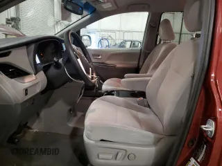 2015 Toyota Sienna LE AAS с VIN 5TDKK3DC2FS677288, выставлен на аукционе Copart как лот 57882845 с пробегом 162 458 миль миль и Списание • Salvage title. История ставок и продаж доступна на DreamBid. Изображение 7.