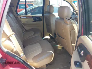 2002 GMC Envoy SLT with VIN 1GKDS13S922205147, listed as a IAAI auction lot 42041118 with 127,400 mi miles. Bid and sale history available at carsss.com. Image 8.