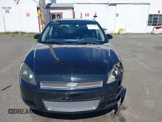 2014 Chevrolet Impala LT with VIN 2G1WB5E30E1166401, listed as a IAAI auction lot 42071504 with 158,813 mi miles and . Bid and sale history available at DreamBid. Image 12.