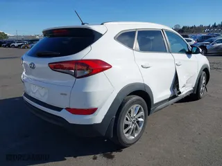 2016 Hyundai Tucson SE with VIN KM8J3CA44GU200294, listed as a IAAI auction lot 41678222 with 65,468 mi miles. Bid and sale history available at carsss.com. Image 4.