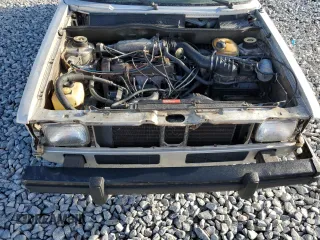 1982 Volkswagen Rabbit z VIN 1MB0174CV060266, wystawiony jako Copart lot #49385145 z przebiegiem 118 498 mil mil oraz Szkody całkowita. Historia ofert i sprzedaży dostępna na DreamBid. Obrazek 11.