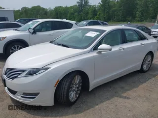 2015 Lincoln MKZ z VIN 3LN6L2G96FR625086, wystawiony jako IAAI lot #42406467 z przebiegiem 24 130 mil mil oraz . Historia ofert i sprzedaży dostępna na DreamBid. Obrazek 2.