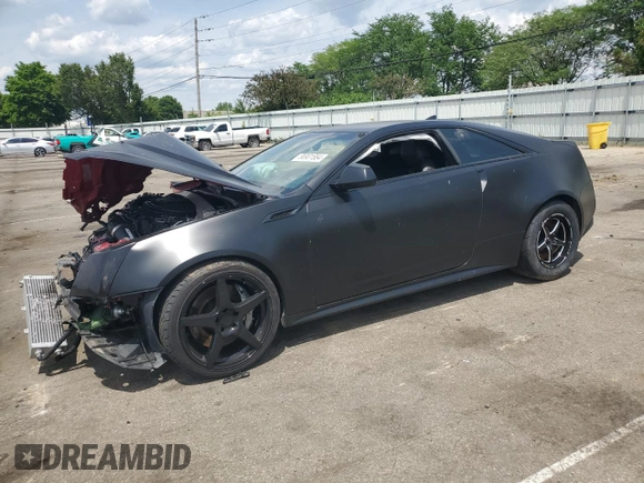 2011 Cadillac CTS-V z VIN 1G6DV1EP1B0154043, wystawiony jako Copart lot #56901884 z przebiegiem Nie podano mil oraz Szkoda całkowita • Salvage title. Historia ofert i sprzedaży dostępna na DreamBid. Obrazek 1.