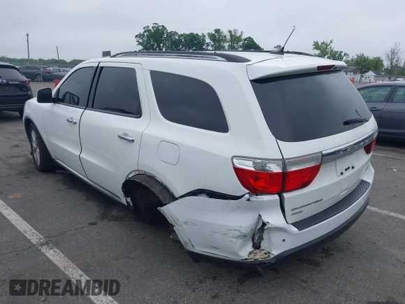 2013 Dodge Durango Crew with VIN 1C4RDJDG4DC518156, listed as a IAAI auction lot 42516880 with 162,402 mi miles and . Bid and sale history available at DreamBid. Image 3.