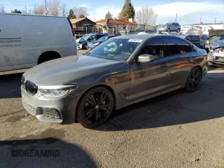 2019 BMW 5 Series M550i xDrive with VIN WBAJB9C55KB288709, listed as a Copart auction lot 46590735 with 58,256 mi miles and Salvage title. Bid and sale history available at DreamBid. Image 1.