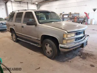 1999 Chevrolet Tahoe Z71 with VIN 1GNEK13R7XJ577796, listed as a IAAI auction lot 41036617 with 231,795 mi miles. Bid and sale history available at carsss.com. Image 1.