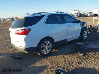 2021 Chevrolet Equinox Premier with VIN 3GNAXNEV0MS154053, listed as a IAAI auction lot 41311479 with 63,966 mi miles. Bid and sale history available at carsss.com. Image 4.