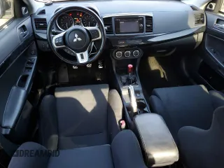 2014 Mitsubishi Lancer Evolution GSR z VIN JA32W8FV6EU018171, wystawiony jako Copart lot #77109934 z przebiegiem 83 467 mil mil oraz Tytuł czysty. Historia ofert i sprzedaży dostępna na DreamBid. Obrazek 8.