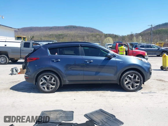 2020 Kia Sportage EX with VIN KNDPNCAC3L7752538, listed as a IAAI auction lot 42060920 with 68,740 mi miles and . Bid and sale history available at DreamBid. Image 14.
