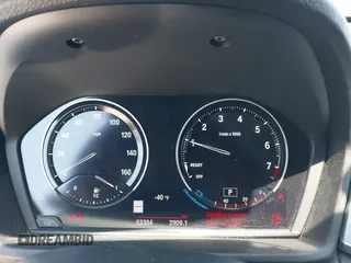 2021 BMW X1 sDrive28i with VIN WBXJG7C06M5T14235, listed as a IAAI auction lot 42021762 with 53,384 mi miles and . Bid and sale history available at DreamBid. Image 7.
