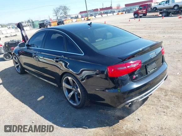2013 Audi S6 Prestige with VIN WAUJ2AFC0DN096028, listed as a IAAI auction lot 41817347 with 132,992 mi miles. Bid and sale history available at carsss.com. Image 3.