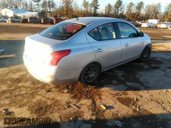 2012 Nissan Versa SV with VIN 3N1CN7AP4CL879273, listed as a IAAI auction lot 41316515 with 104,147 mi miles. Bid and sale history available at carsss.com. Image 4.