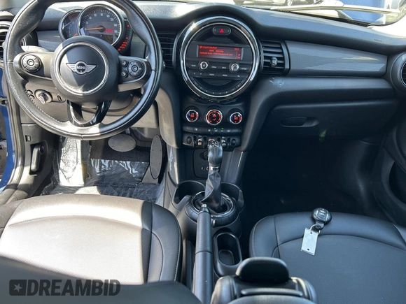 2015 MINI Hardtop 4 Door with VIN WMWXS5C5XFT831166, listed as a Copart auction lot 56714285 with 69,668 mi miles and Salvage Title. Bid and sale history available at DreamBid. Image 9.