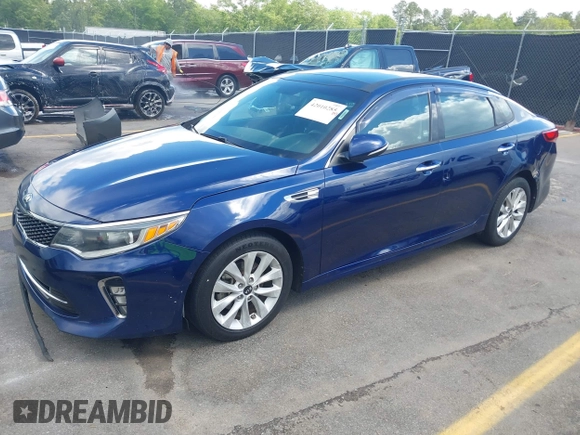 2018 Kia Optima LX with VIN 5XXGT4L32JG189009, listed as a IAAI auction lot 42010285 with 313,004 mi miles. Bid and sale history available at carsss.com. Image 2.