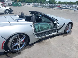 2014 Chevrolet Corvette Z51 3LT z VIN 1G1YM3D7XE5120603, wystawiony jako IAAI lot #42313984 z przebiegiem 64 199 mil mil oraz . Historia ofert i sprzedaży dostępna na DreamBid. Obrazek 6.
