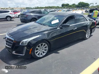 2014 Cadillac CTS RWD with VIN 1G6AP5SX0E0185913, listed as a IAAI auction lot 42685622 with 107,406 mi miles and . Bid and sale history available at DreamBid. Image 2.