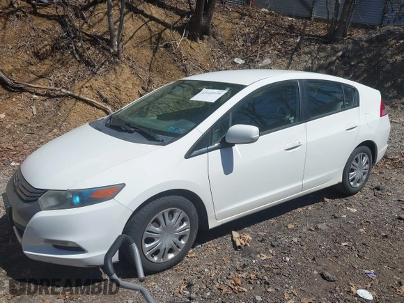 2011 Honda Insight with VIN JHMZE2H30BS012285, listed as a IAAI auction lot 42145139 with 161,672 mi miles and . Bid and sale history available at DreamBid. Image 2.