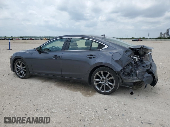 2016 Mazda 6 i Grand Touring с VIN JM1GJ1W50G1477892, выставлен на аукционе Copart как лот 55362525 с пробегом 80 806 миль миль и Списание • Salvage title. История ставок и продаж доступна на DreamBid. Изображение 2.