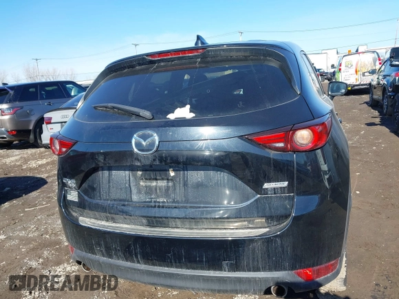 2018 Mazda CX-5 Grand Touring with VIN JM3KFBDM5J0441518, listed as a IAAI auction lot 41748941 with 64,639 mi miles. Bid and sale history available at carsss.com. Image 16.